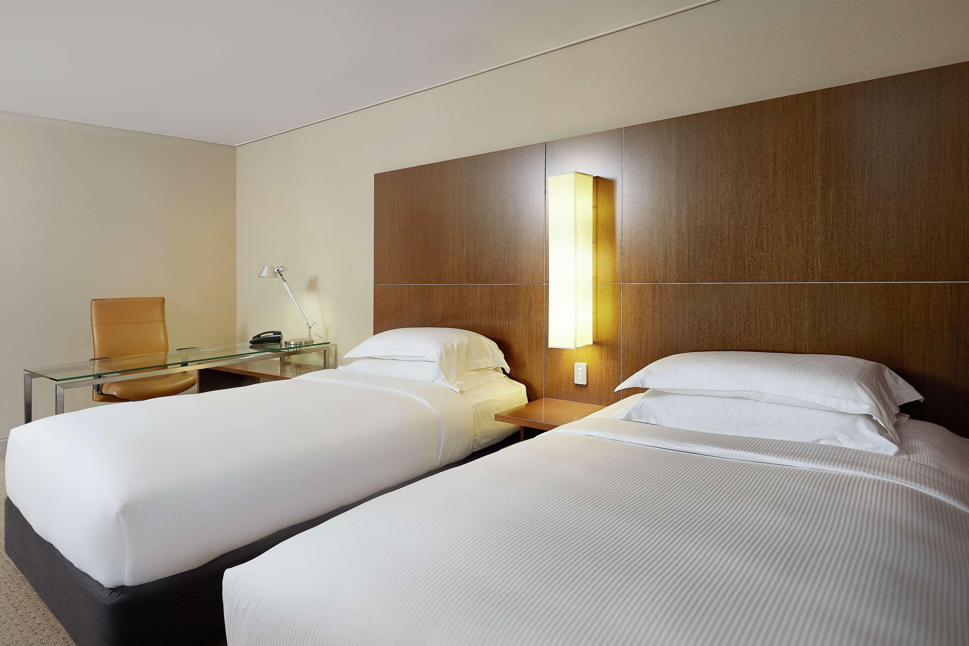 힐튼 브리즈번 외부 사진 A typical room at the hotel